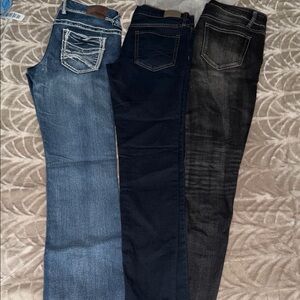 Set of Three Denim Jeans in Blue, Dark Blue, and Black